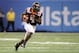 NEW ORLEANS, LA - JANUARY 03: David Wilson #4 of the Virginia Tech Hokies runs the ball against the Michigan Wolverines during the Allstate Sugar Bowl at Mercedes-Benz Superdome on January 3, 2012 in New Orleans, Louisiana. (Photo by Matthew Stockman/Getty Images)