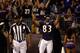 BALTIMORE, MD - AUGUST 25: Wide receiver Lee Evans #83 of the Baltimore Ravens celebrates after scoring a touchdown against the Washington Redskins during the first half of a preseason game at M&T Bank Stadium on August 25, 2011 in Baltimore, Maryland. (Photo by Rob Carr/Getty Images)
