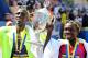 BOSTON, MA - APRIL 16: Wesley Korir of Kenya, men's winner, and Sharon Cherop of Kenya, female winner, of the 116th Boston Marathon, react on the April 15, 2012 in Boston, Massachusetts. (Photo by Jim Rogash/Getty Images)