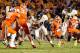 MIAMI GARDENS, FL - JANUARY 04: Shawne Alston #20 of the West Virginia Mountaineers runs the ball against the Clemson Tigers during the Discover Orange Bowl at Sun Life Stadium on January 4, 2012 in Miami Gardens, Florida. (Photo by J. Meric/Getty Images)