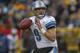 GREEN BAY, WI - JANUARY 01: Matthew Stafford #9 of the Detroit Lions looks for a receiver against the Green Bay Packers at Lambeau Field on January 1, 2012 in Green Bay, Wisconsin. The Packers defeated the Lions 45-41. (Photo by Jonathan Daniel/Getty Images)
