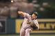ANAHEIM, CA - APRIL 18: Bartolo Colon #21 of the Oakland Athletics throws a pitch against the Los Angeles Angels of Anaheim at Angel Stadium of Anaheim on April 18, 2012 in Anaheim, California. (Photo by Stephen Dunn/Getty Images)