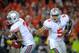 LINCOLN, NE - OCTOBER 8: Quarterback Braxton Miller #5 of the Ohio State Buckeyes hands the ball to teammate running back Jordan Hall #7 during their game against the Nebraska Cornhuskers at Memorial Stadium October 8, 2011 in Lincoln, Nebraska. (Photo by Eric Francis/Getty Images)