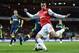 LONDON, ENGLAND - APRIL 16: Robin van Persie of Arsenal is tackled by Emmerson Boyce of Wigan during the Barclays Premier League match between Arsenal and Wigan Athletic at Emirates Stadium on April 16, 2012 in London, England. (Photo by Laurence Griffiths/Getty Images)