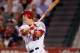 ANAHEIM, CA - SEPTEMBER 26: Mike Trout #27 of the Los Angeles Angels of Anaheim hits an RBI single against the Texas Rangers in the sixth inning at Angel Stadium of Anaheim on September 26, 2011 in Anaheim, California. The Rangers defeated the Angels 4-3. (Photo by Jeff Gross/Getty Images)