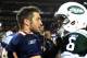DENVER, CO - NOVEMBER 17: Tim Tebow #15 of the Denver Broncos talks with Mark Sanchez #6 of the New York Jets following the game at Sports Authority Field at Mile High on November 17, 2011 in Denver, Colorado. (Photo by Garrett W. Ellwood/Getty Images)