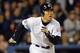 BRONX, NY - OCTOBER 25: Left fielder Hideki Matsui #55 of the New York Yankees runs to first during game six of the Major League Baseball World Series against the Florida Marlins on October 25, 2003 at Yankee Stadium in the Bronx, New York. The Marlins won 2-0 to win their second World Series in franchise history. (Photo by Ezra Shaw/Getty Images)