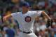 CHICAGO, IL - APRIL 07: Kerry Wood #34 of the Chicago Cubs pitches against the Washington Nationals at Wrigley Field on April 7, 2012 in Chicago, Illinois. The Nationals defeated the Cubs 7-4. (Photo by Jonathan Daniel/Getty Images)