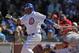 CHICAGO, IL - APRIL 05: Marlon Byrd #24 of the Chicago Cubs hits a run-scoring single in the 4th inning against the Washington Nationals during the opening day game at Wrigley Field on April 5, 2012 in Chicago, Illinois. (Photo by Jonathan Daniel/Getty Images)