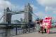 LONDON, ENGLAND - APRIL 20: Competitors attempting to break various Guinness World Records pose in front of Tower Bridge during a photocall ahead of the Virgin London Marathon 2012 on April 20, 2012 in London, England. Mark Millrine will attempt to break the Guinness World Record for the fastest marathon completed dressed as a book character. Marc Jenner, dressed in costume as children's tv programme character Bagpuss will attempt to break the Guinness World Record for the fastest marathon completed dressed as a television character. (Photo by Andrew Redington/Getty Images)