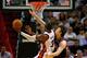 MIAMI, FL - APRIL 19: Dwyane Wade #3 of the Miami Heat shoots over Omer Asik #3 of the Chicago Bulls during a game at American Airlines Arena on April 19, 2012 in Miami, Florida. NOTE TO USER: User expressly acknowledges and agrees that, by downloading and/or using this Photograph, User is consenting to the terms and conditions of the Getty Images License Agreement. (Photo by Mike Ehrmann/Getty Images)