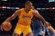 LOS ANGELES, CA - MARCH 29: Metta World Peace #15 of the Los Angeles Lakers dribbles as he fends off James Harden #13 of the Oklahoma City Thunder at Staples Center on March 29, 2012 in Los Angeles, California. NOTE TO USER: User expressly acknowledges and agrees that, by downloading and or using this photograph, User is consenting to the terms and conditions of the Getty Images License Agreement. (Photo by Harry How/Getty Images)