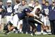STATE COLLEGE, PA - OCTOBER 15: D'Anton Lynn #8 of the Penn State Nittany Lions makes a tackle against Waynelle Gravesande #3 of the Purdue Boilermakers during the game on October 15, 2011 at Beaver Stadium in State College, Pennsylvania. (Photo by Justin K. Aller/Getty Images)