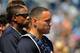 TAMPA, FL - APRIL 04: Catcher Russell Martin #55 of the New York Yankees stands for the National Anthem before play against the New York Mets in a spring training game April 4, 2012 at George M. Steinbrenner Field in Tampa, Florida. (Photo by Al Messerschmidt/Getty Images)