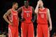 LOS ANGELES, CA - APRIL 06: Courtney Lee #5, Samuel Dalembert #21 and Chase Budinger #10 of the Houston Rockets wait for the start of play during the game against the Los Angeles Lakers at Staples Center on April 6, 2012 in Los Angeles, California. NOTE TO USER: User expressly acknowledges and agrees that, by downloading and or using this photograph, User is consenting to the terms and conditions of the Getty Images License Agreement. (Photo by Harry How/Getty Images)