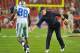 TAMPA, FL - DECEMBER 17: Coach Jason Garrett applauds wide receiver Dez Bryant #88 of the Dallas Cowboys before play against the Tampa Bay Buccaneers December 17, 2011 at Raymond James Stadium in Tampa, Florida. (Photo by Al Messerschmidt/Getty Images)