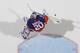 UNIONDALE, NY - DECEMBER 29: Evgeni Nabokov #20 of the New York Islanders tends net against the Calgary Flames at the Nassau Veterans Memorial Coliseum on December 29, 2011 in Uniondale, New York. (Photo by Bruce Bennett/Getty Images)