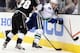 Ryan Kesler takes a hit from Jarret Stoll.