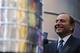 NEW YORK, NY - APRIL 11: NHL Commissioner Gary Bettman stands next to the Stanley Cup trophy in Times Square on April 11, 2012 in New York City. To kick off the start of the NHL Stanley Cup playoffs, a 21 foot, 6,600 pound replica of the Stanley Cup trophy was unveiled in Times Square. The replica trophy doubles as a water fountain that New York residents and visitors can drink from. (Photo by Justin Sullivan/Getty Images)