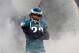PHILADELPHIA, PA - NOVEMBER 27: Asante Samuel #22 of the Philadelphia Eagles takes the field through the smoke during player introductions against the New England Patriots at Lincoln Financial Field on November 27, 2011 in Philadelphia, Pennsylvania. (Photo by Patrick McDermott/Getty Images)