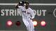 BOSTON, MA - AUGUST 30: Carl Crawford #13 of the Boston Red Sox makes the catch for the out against the New York Yankees on August 30, 2011 at Fenway Park in Boston, Massachusetts. (Photo by Elsa/Getty Images)