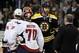 BOSTON, MA - APRIL 25: Zdeno Chara #33 of the Boston Bruins shakes hands with Braden Holtby #70 of the Washington Capitals after Game Seven of the Eastern Conference Quarterfinals during the 2012 NHL Stanley Cup Playoffs at TD Garden on April 25, 2012 in Boston, Massachusetts. The Washington Capitals defeated the Boston Bruins 2-1 in overtime. (Photo by Elsa/Getty Images)