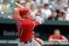 BALTIMORE, MD - JULY 24: Mike Trout #27 of the Los Angeles Angels of Anaheim follows his three RBI home run against the Baltimore Orioles during the eighth inning at Oriole Park at Camden Yards on July 24, 2011 in Baltimore, Maryland. The Angels defeated the Orioles 9-3. (Photo by Rob Carr/Getty Images)