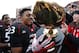 CINCINNATI, OH - DECEMBER 03: Isaiah Pead #23 of the Cincinnati Bearcats holds the Big East Championship Trophy as he celebrates with fans after the Bearcats defeated the Connecticut Huskies 35-27 to claim their share of the 2011 Big East Championship on December 3, 2011 at Nippert Stadium in Cincinnati, Ohio. (Photo by Tyler Barrick/Getty Images)