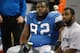 DETROIT - DECEMBER 23: Shaun Rogers #92 of the Detroit Lions watches from the bench during the game against the Kansas City Chiefs on December 23, 2007 at Ford Field in Detroit, Michigan. (Photo byGregory Shamus/Getty Images)