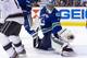 VANCOUVER, CANADA - APRIL 11: Goalie Roberto Luongo #1 of the Vancouver Canucks makes a glove save during the first period in Game One of the Western Conference Quarterfinals during the 2012 NHL Stanley Cup Playoffs at Rogers Arena on April 11, 2012 in Vancouver, British Columbia, Canada. (Photo by Rich Lam/Getty Images)