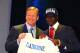 NEW YORK, NY - APRIL 26: Morris Claiborne (R)from LSU holds up a jersey as he stands on stage with NFL Commissioner Roger Goodell after he was selected #6 overall by the Dallas Cowboys in the first round of during the 2012 NFL Draft at Radio City Music Hall on April 26, 2012 in New York City. (Photo by Al Bello/Getty Images)