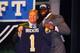 NEW YORK, NY - APRIL 26: Michael Brockers (R) of LSU holds up a jersey as he stands on stage with NFL Commissioner Roger Goodell after he was selected #14 overall by the St. Louis Rams in the first round of the 2012 NFL Draft at Radio City Music Hall on April 26, 2012 in New York City. (Photo by Al Bello/Getty Images)