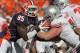CHAMPAIGN, IL - OCTOBER 15: Whitney Mercilus #85 of the Illinois Fighting Illini rushes against Jack Mewhort #74 of the Ohio State Buckeyes at Memorial Stadium on October 15, 2011 in Champaign, Illinois. Ohio State defeated Illinois 17-7. (Photo by Jonathan Daniel/Getty Images)