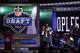 NEW YORK, NY - APRIL 26: Quinton Coples of North Carolina holds up a jersey as he stands on stage with NFL Commissioner Roger Goodell after he was selected #16 overall by the New York Jets in the first round of the 2012 NFL Draft at Radio City Music Hall on April 26, 2012 in New York City. (Photo by Chris Chambers/Getty Images)