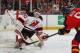 Martin Brodeur makes one of his 43 saves in Game 7.
