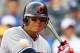 KANSAS CITY, MO - APRIL 15: Shin-Soo Choo #42 of the Cleveland Indians bats during the game against the Kansas City Royals on Jackie Robinson Day on April 15, 2012 at Kauffman Stadium in Kansas City, Missouri. (Photo by Jamie Squire/Getty Images)