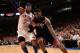 NEW YORK, NY - APRIL 15: LeBron James #6 of the Miami Heat drives against Carmelo Anthony #7 of the New York Knicks at Madison Square Garden on April 15, 2012 in New York City. NOTE TO USER: User expressly acknowledges and agrees that, by downloading and/or using this Photograph, user is consenting to the terms and conditions of the Getty Images License Agreement. (Photo by Chris Trotman/Getty Images)