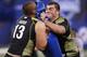 David DeCastro, right, performs a drill at the NFL Scouting Combine