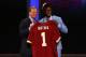 NEW YORK, NY - APRIL 26: Robert Griffin III (R) from Baylor holds up a jersey as he stands on stage with NFL Commissioner Roger Goodell after Griffin was selected #2 overall by the Washington Redskins in the first round of the 2012 NFL Draft at Radio City Music Hall on April 26, 2012 in New York City. (Photo by Chris Chambers/Getty Images)