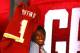 NEW YORK, NY - APRIL 26: Robert Griffin III from Baylor holds up a jersey as he stands after Griffin was selected #2 overall by the Washington Redskins in the first round of the 2012 NFL Draft at Radio City Music Hall on April 26, 2012 in New York City. (Photo by Al Bello/Getty Images)