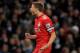 MANCHESTER, ENGLAND - JANUARY 11: Steven Gerrard of Liverpool celebrates scoring the opening goal from a penalty kick during the Carling Cup Semi Final First Leg match between Manchester City and Liverpool at the Etihad Stadium on January 11, 2012 in Manchester, England. (Photo by Michael Regan/Getty Images)