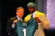 NEW YORK, NY - APRIL 26: Fletcher Cox of Mississippi State holds up a jersey as he stands on stage with NFL Commissioner Roger Goodell after he was selected #12 overall by the Seattle Seahawks in the first round of the 2012 NFL Draft at Radio City Music Hall on April 26, 2012 in New York City. (Photo by Al Bello/Getty Images)