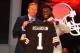 NEW YORK, NY - APRIL 26: Trent Richardson (R) from Alabama holds up a jersey as he stands on stage with NFL Commissioner Roger Goodell after he was selected #3 overall by the Cleveland Browns in the first round of the 2012 NFL Draft at Radio City Music Hall on April 26, 2012 in New York City. (Photo by Al Bello/Getty Images)