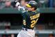 BALTIMORE, MD - APRIL 27: Eric Sogard #28 of the Oakland Athletics hits a home run in the second inning against the Baltimore Orioles at Oriole Park at Camden Yards on April 27, 2012 in Baltimore, Maryland. (Photo by Greg Fiume/Getty Images)