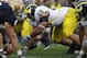 SOUTH BEND, IN - SEPTEMBER 11: Mike Martin #68 of the Michigan Wolverines awaits the start of play against the Notre Dame Fighting Irish at Notre Dame Stadium on September 11, 2010 in South Bend, Indiana. Michigan defeated Notre Dame 28-24. (Photo by Jonathan Daniel/Getty Images)