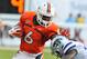 MIAMI GARDENS, FL - SEPTEMBER 24: Running back Lamar Miller #6 of the Miami Hurricanes rushes upfield against the Kansas State University Wildcats September 24, 2011 at Sun Life Stadium in Miami Gardens, Florida. (Photo by Al Messerschmidt/Getty Images)