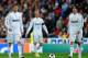 MADRID, SPAIN - MARCH 10: Gonzalo Higuain (L) of Real Madrid trudges back to the half way line with his team mates Kaka (R) and Jose Maria Gutierrez after conceding a goal during the UEFA Champions League round of 16 second leg match between Real Madrid and Lyon at the Estadio Santiago Bernabeu on March 10, 2010 in Madrid, Spain. Real Madrid drew the match against Lyon in the second leg match but lost 2-1 on agregate. (Photo by Jasper Juinen/Getty Images)