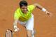 BARCELONA, SPAIN - APRIL 28: Milos Raonic of Canada returns the ball against David Ferrer of Spain during their Semi-final match of the ATP 500 World Tour Barcelona Open Banco Sabadell 2012 tennis tournament at the Real Club de Tenison April 28, 2012 in Barcelona, Spain. Ferrer won 7-6, 7-6. (Photo by David Ramos/Getty Images)
