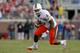 TALLAHASSEE, FL - NOVEMBER 12: Lamar Miller #6 of the Miami Hurricanes rushes during a game against the Florida State Seminoles at Doak Campbell Stadium on November 12, 2011 in Tallahassee, Florida. (Photo by Mike Ehrmann/Getty Images)
