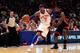 NEW YORK, NY - APRIL 15: (L) Carmelo Anthony #7 of the New York Knicks drives against (R) LeBron James #6 of the Miami Heat at Madison Square Garden on April 15, 2012 in New York City. NOTE TO USER: User expressly acknowledges and agrees that, by downloading and/or using this Photograph, user is consenting to the terms and conditions of the Getty Images License Agreement. (Photo by Chris Trotman/Getty Images)
